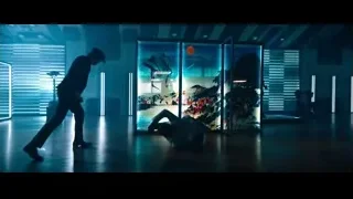 Man dancing in futuristic gallery — John Wick: Chapter 4