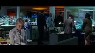 woman in lab coat on phone in laboratory — The Amazing Spider Man 2