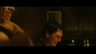 two men playing drums in dimly lit room — Whiplash