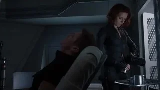 woman with gun over man in futuristic room — The Avengers