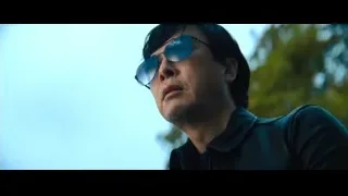 man in black jacket and cap outdoors — John Wick: Chapter 4