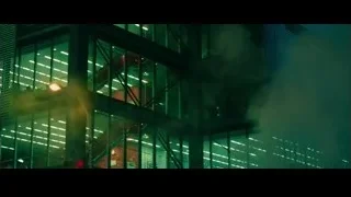Busy city street with tall buildings at night — Whiplash
