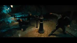 Stairs in dark alleyway at night — John Wick: Chapter 4