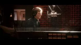 young man in recording studio with microphone — Jobs