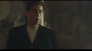 Young man in suit by stone wall — Peaky Blinders