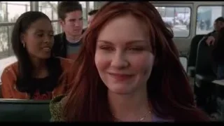two young women talking on bus — Spider Man