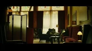 people conversing in room with stained glass window — Whiplash