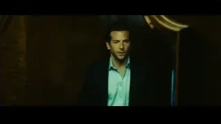 man standing in dark room with door — Limitless