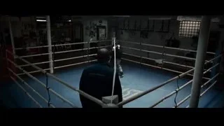 man holding punching bag in boxing ring — Southpaw