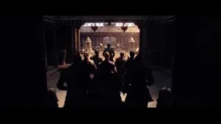 People gathered in stone temple entrance — Doctor Strange 2