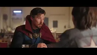 man in red cape at restaurant — Doctor Strange 2