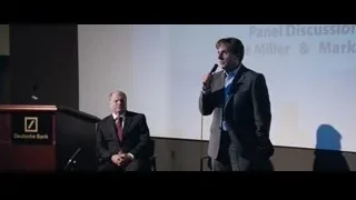 man giving presentation on stage — The Big Short