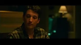 Young man deep in thought in dimly lit room — Whiplash