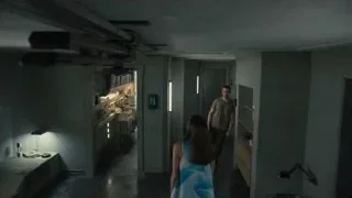 Man and woman walking in hospital hallway — Blade Runner 2049