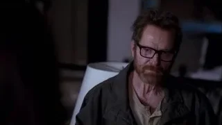 man with beard and glasses in dim room — Breaking Bad