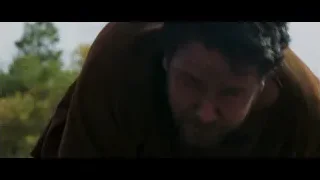 Man crouching with arms stretched in outdoor setting — Gladiator