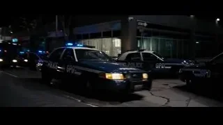 police cars on city street at night — Batman: The Dark Knight Rises