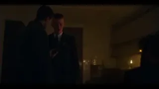two men in suits in dimly lit room — Peaky Blinders