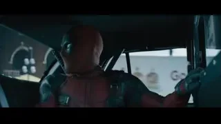 Deadpool driving car in city — Deadpool 2