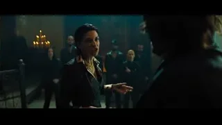Woman speaking into microphone in room — John Wick: Chapter 4