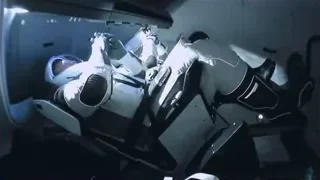 person in white suit lying on bed — Elon Musk: Return to Space
