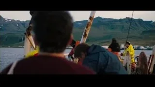 man on boat looking at mountains — The Secret Life of Walter Mitty