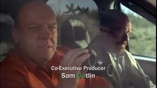 Two men in car looking through binoculars — Breaking Bad