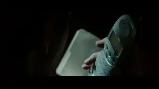 Hand holding a phone — Limitless