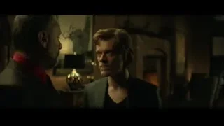 two men talking in dimly lit room — John Wick