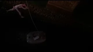 Person hanging upside down from rope — Spider Man