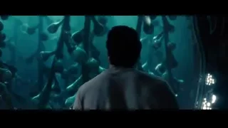 man in front of large aquarium — Superman: Man of Steel