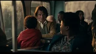 people sitting on a bus — Joker