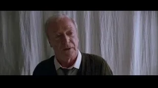 Older man's face with serious expression — Batman