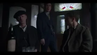 two men sitting in dimly lit room — Peaky Blinders