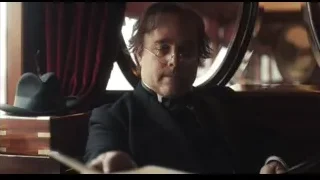 man in car looking out window — Peaky Blinders