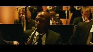Musicians playing instruments in orchestra — Whiplash