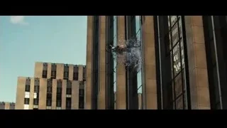 Man hanging upside down from tall building — The Secret Life of Walter Mitty