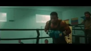 boxer in white mask throwing punch — Creed 3