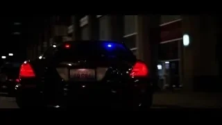 Black car moving at high speed at night — Batman: The Dark Knight