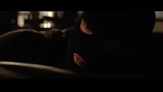 person in black balaclava in dark room — Batman
