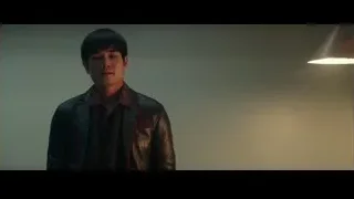 young man in leather jacket in dark room — Bruce Lee: Birth of The Dragon