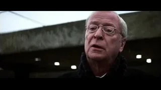 Older man's face with serious expression — Batman: The Dark Knight