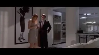 Man and woman conversing in living room — American Psycho