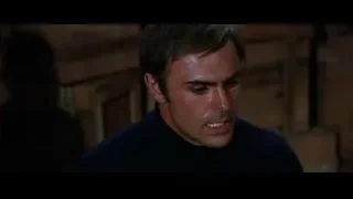 man with serious expression in dim room — Bruce Lee: Enter The Dragon