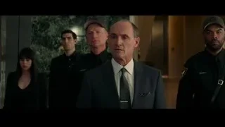 Men in suits in hallway with lion statue — The Amazing Spider Man 2