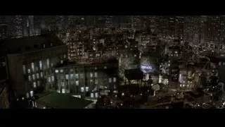 Aerial view of chaotic city at night — Batman