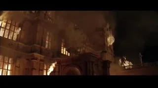 large building engulfed in flames — Batman