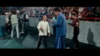 man and boy on stage with crowd — The Karate Kid