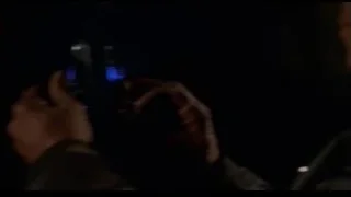 Man in suit holding a gun — Spider Man