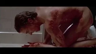 Man with bloody face in bathroom — American Psycho